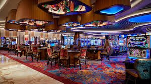 Bigger Bass Bonanza slot game interface on qqmamibet login showing reels, bonus meter, and payout display